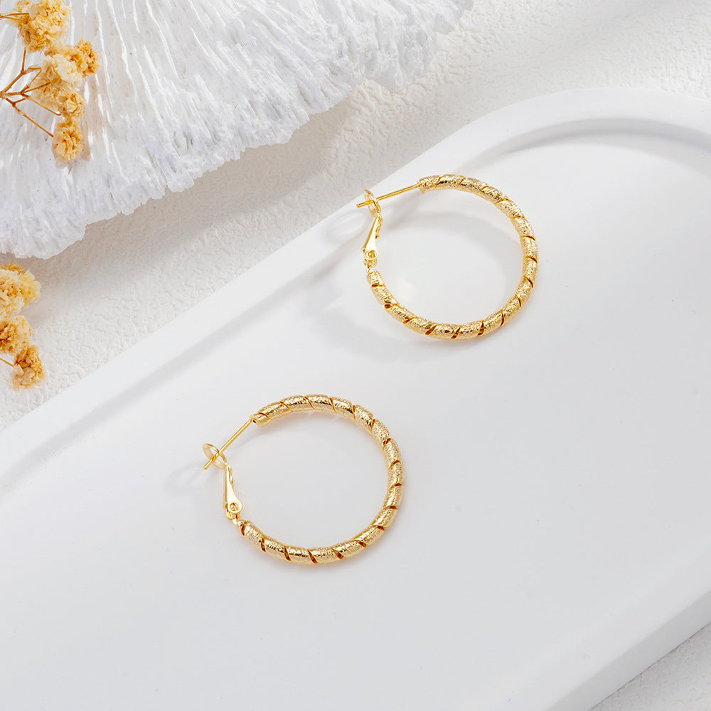 New Commuter-friendly Gold Twisted Hoop Earrings That Go With Everything