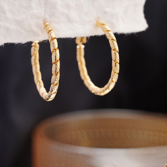 New Commuter-friendly Gold Twisted Hoop Earrings That Go With Everything